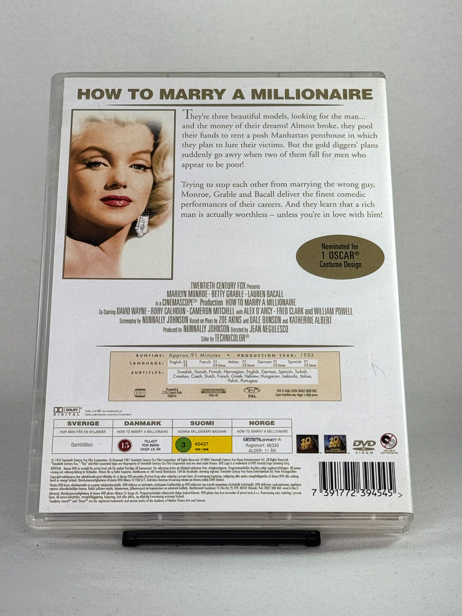 Bakside av DVD-cover til How to Marry a Millionaire – brukt DVD-film; spesifikasjoner og språk.