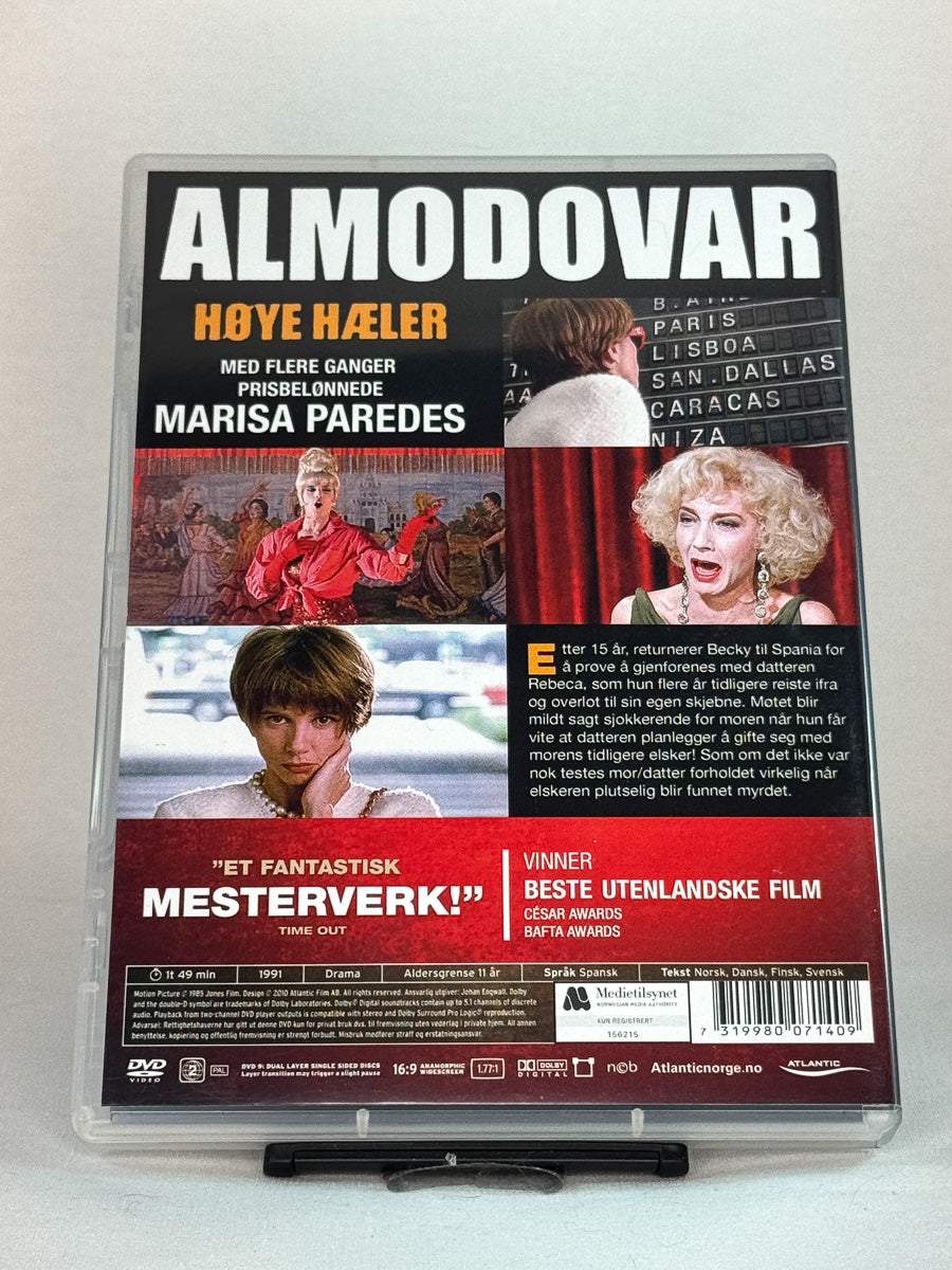 Bakside av DVD-cover til Høye hæler, bruktfilm hos nettbutikken Brukbar Film