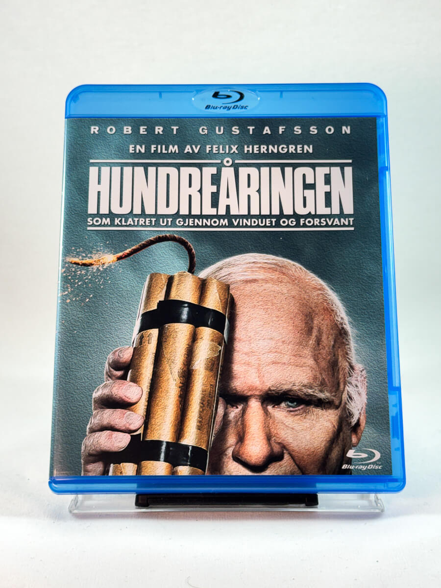 Forside av cover til Hundreåringen som klatret ut gjennom vinduet og forsvant, brukt Blu-ray hos Brukbar Film