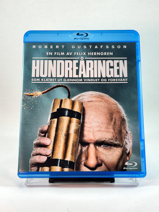 Forside av cover til Hundreåringen som klatret ut gjennom vinduet og forsvant, brukt Blu-ray hos Brukbar Film