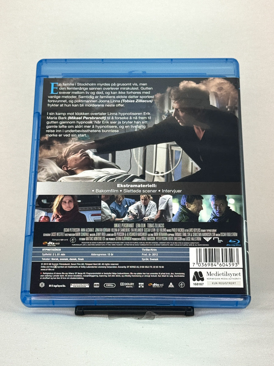 Bakside av Blu-ray-cover til Hypnotisøren – mørk krimthriller med Mikael Persbrandt og Lena Olin, brukt Blu-ray-utgave tilgjengelig hos Brukbar Film.