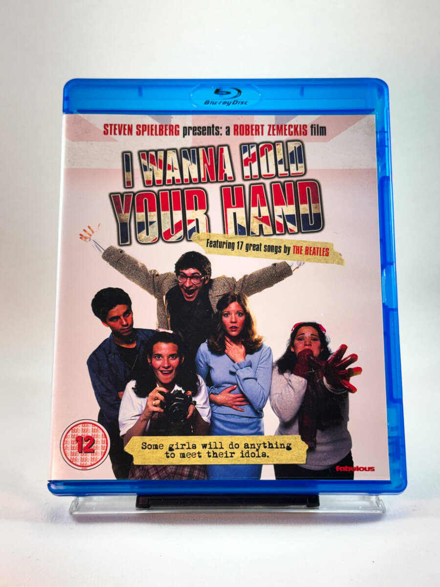 Forside av cover til I Wanna Hold Your Hand, brukt Blu-ray film hos nettbutikken Brukbar Film