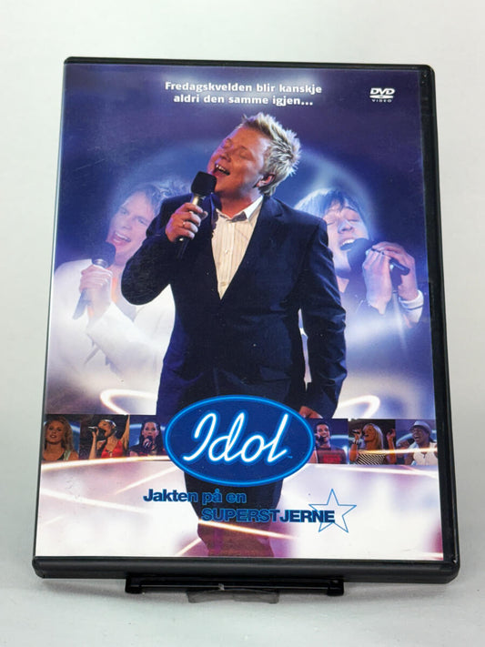 Forside av brukt DVD Idol – Jakten på en superstjerne, norsk musikkprogram med original coverdesign tilgjengelig hos Brukbar Film.