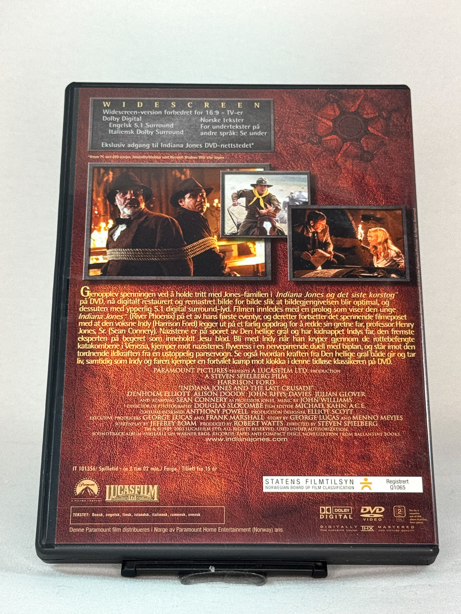 Bakside av DVD-cover til Indiana Jones og det siste korstog – THX-mastret klassiker med humor, spenning og spektakulære scener, brukt originalfilm på DVD hos Brukbar Film. 