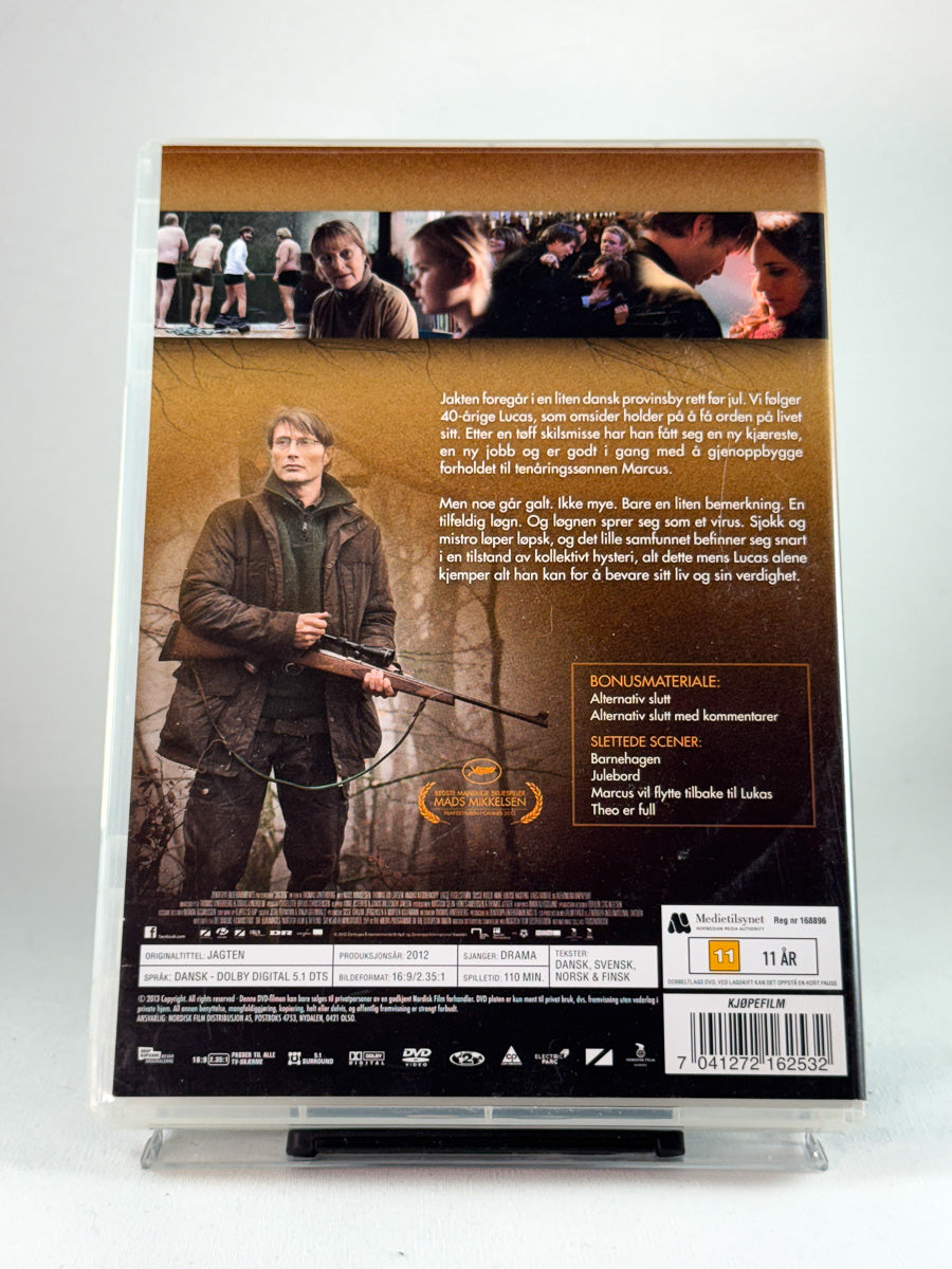 Bakside av DVD-cover til Jakten, bruktfilm hos nettbutikken Brukbar Film