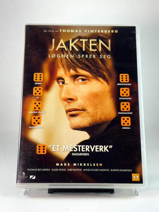 Forside av DVD-cover til Jakten, bruktfilm hos nettbutikken Brukbar Film