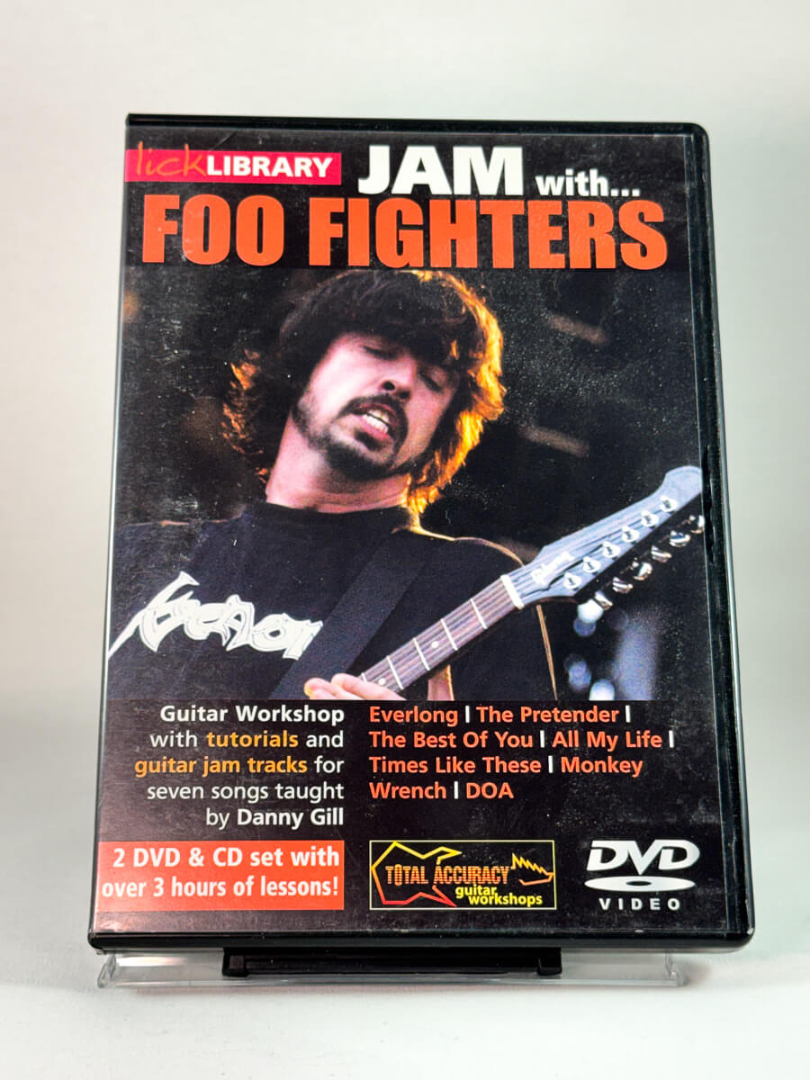 Forside av DVD-cover til Jam with Foo Fighters, gitaropplæring med Foo Fighters-låter, brukt DVD hos Brukbar Film