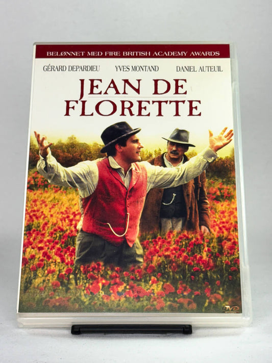 Forside av DVD-cover til Jean de Florette – fransk klassiker med Gérard Depardieu, Yves Montand og Daniel Auteuil – brukt dramafilm på DVD tilgjengelig hos Brukbar Film.
