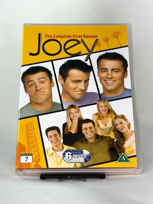 Forside av DVD-cover til Joey – Sesong 1 – brukt komiserie på DVD fra nettbutikken Brukbar Film