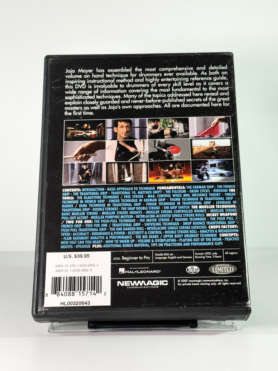 Bakside av cover til Jojo Mayer – Secret Weapons for the Modern Drummer, brukt original DVD hos Brukbar Film