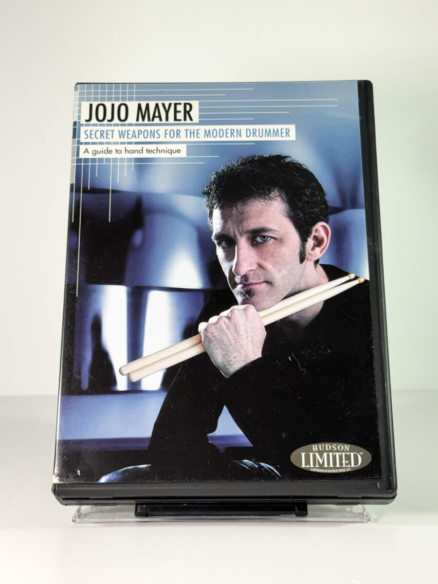 Forside av cover til Jojo Mayer – Secret Weapons for the Modern Drummer, bruktfilm på DVD hos Brukbar Film