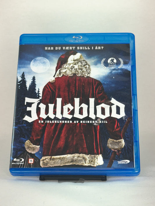 Forside av Blu-ray-cover til Juleblod – norsk juleslasher regissert av Reinert Kiil, brukt Blu-ray hos Brukbar Film