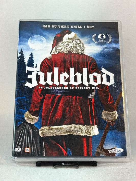 Forside av DVD-cover til Juleblod (2017) – norsk juleslasher regissert av Reinert Kiil, med Marte Sæteren og Stig Henrik Hoff – brukt horrorfilm på DVD hos Brukbar Film.