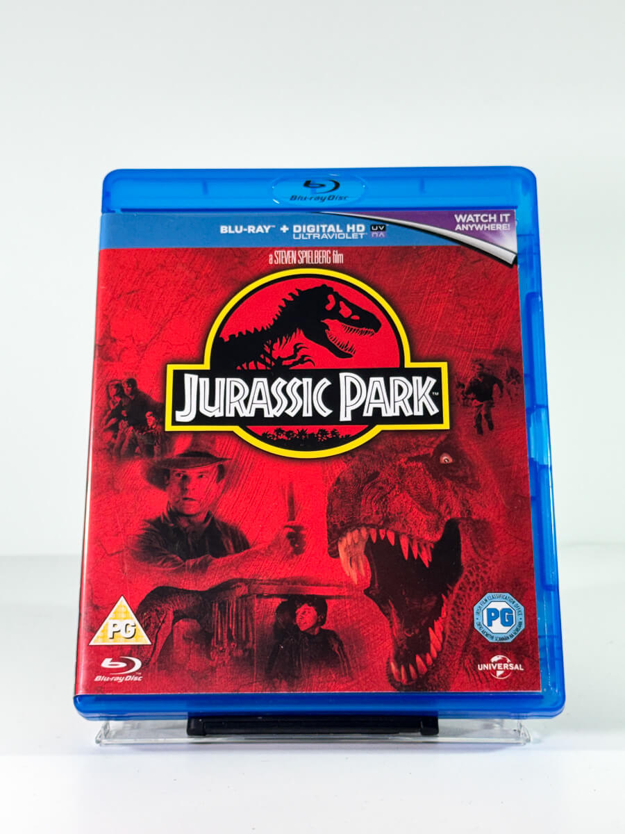 Forside av cover til Jurassic Park, bruktfilm hos nettbutikken Brukbar Film