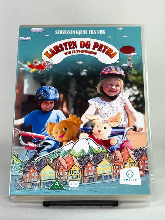 DVD-forside til filmen Karsten og Petra - Alle 12 TV-episodene
Originalt cover brukt for produktbilde i nettbutikken Brukbar Film
