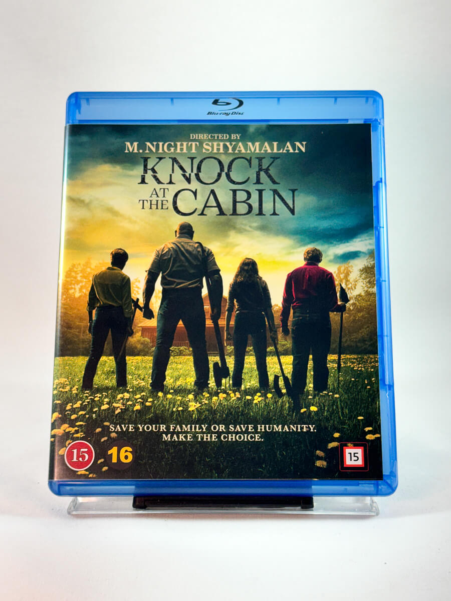 Forside av cover til Knock at the Cabin, brukt Blu-ray hos Brukbar Film