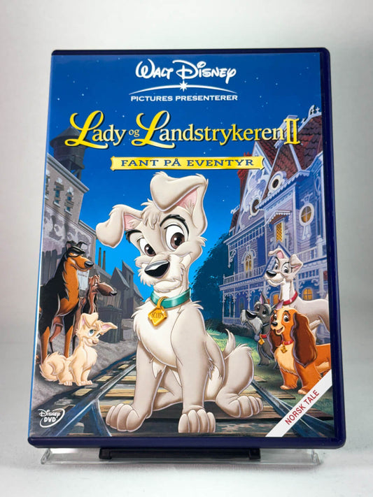 Forside av DVD-cover til Lady og Landstrykeren II – Fant på eventyr, brukt DVD hos Brukbar Film.