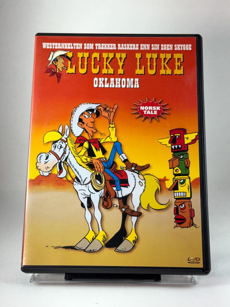 Forside av DVD-cover til Lucky Luke – Oklahoma, brukt tegnefilm på DVD med norsk tale i westernstil hos Brukbar Film