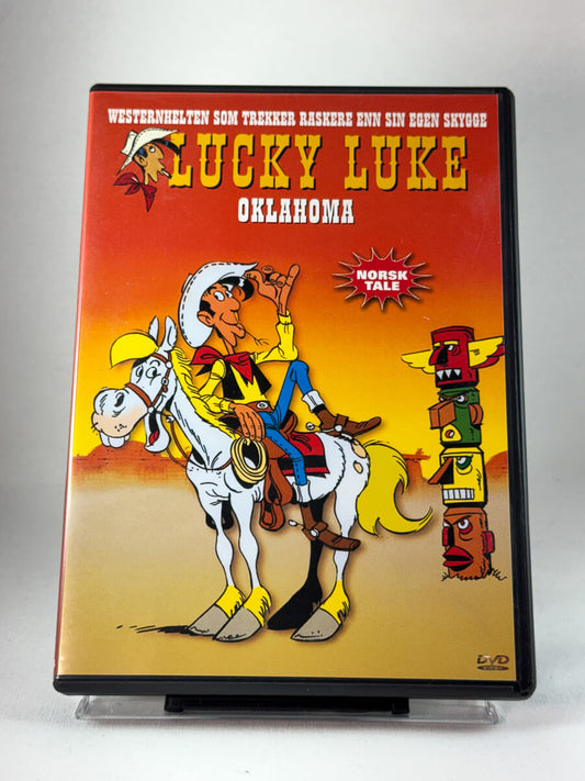 Forside av DVD-cover til Lucky Luke – Oklahoma, brukt tegnefilm på DVD med norsk tale i westernstil hos Brukbar Film