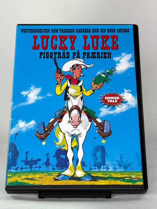 Forside av brukt DVD Lucky Luke – Piggtråd på prærien, norsk tale; filmcover hos Brukbar Film.