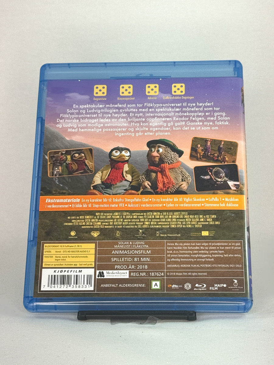 Bakside av Blu-ray-cover for Månelyst i Flåklypa – brukt barnefilm og eventyrfilm på DVD og Blu-ray fra Brukbar Film