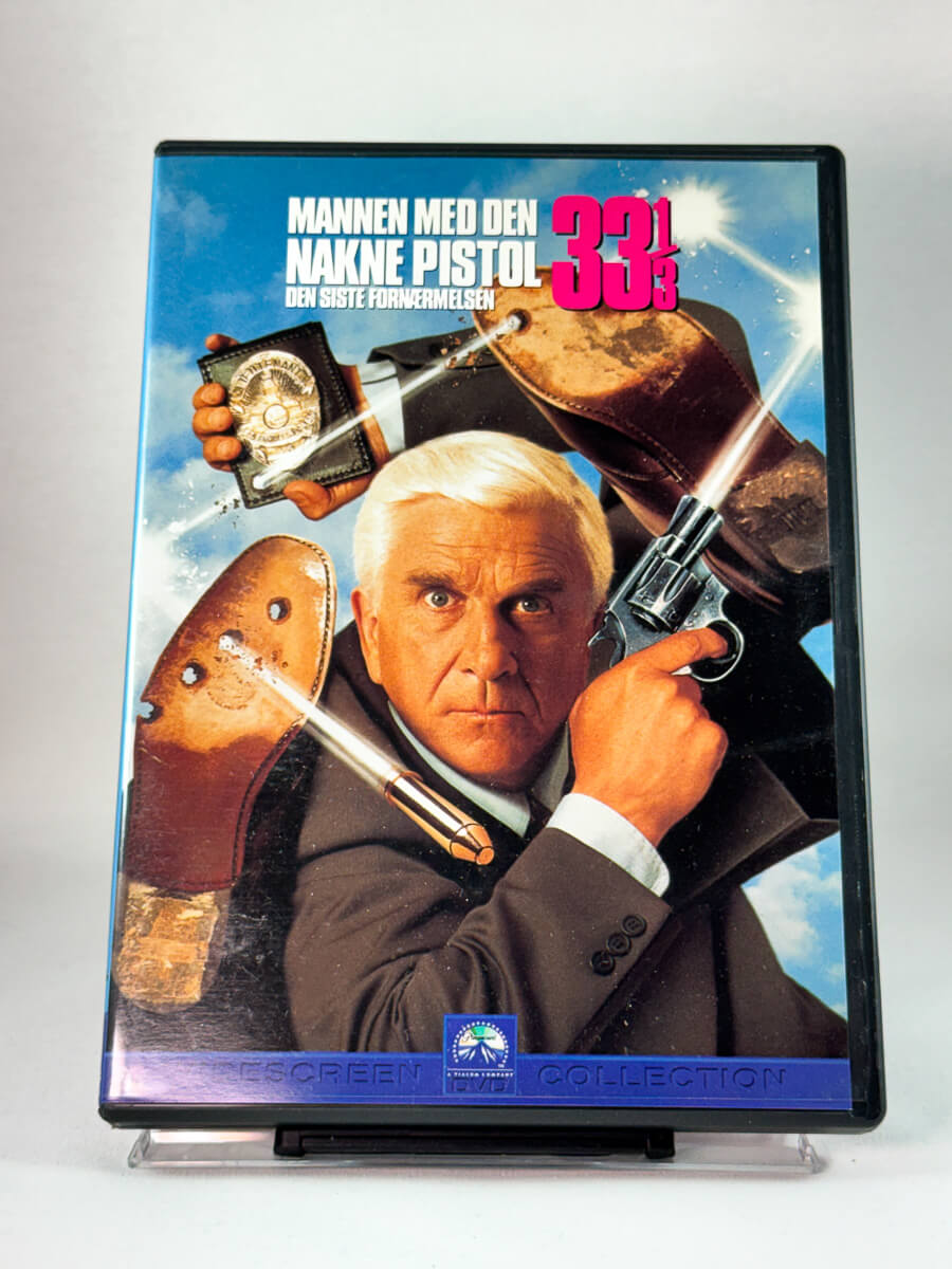 DVD-cover-forside til filmen Mannen med den nakne pistol 33 1/3 – Den siste fornærmelsen – brukt DVD hos Brukbar Film