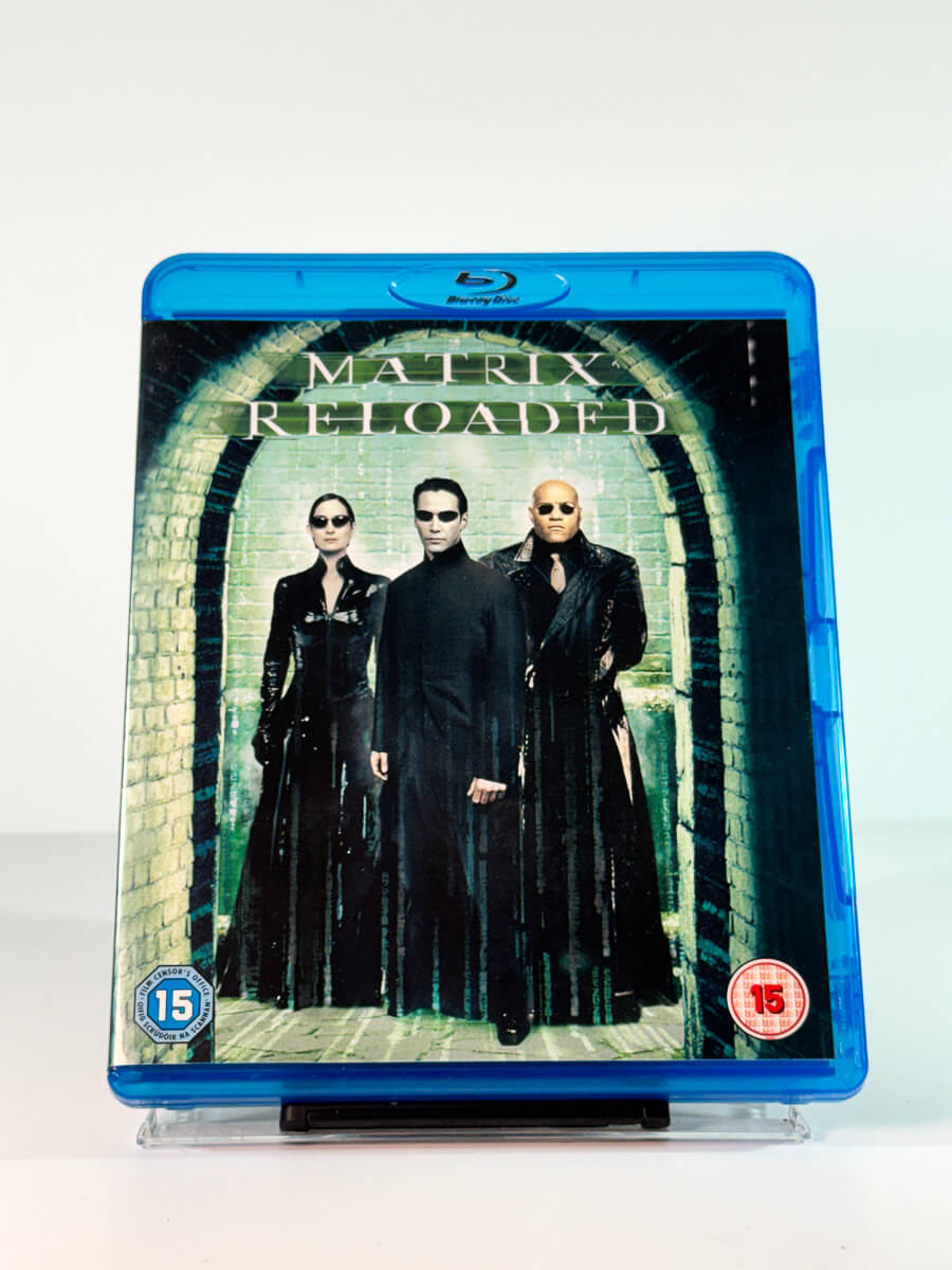 Forside av cover til Matrix Reloaded, bruktfilm på Blu-ray hos Brukbar Film