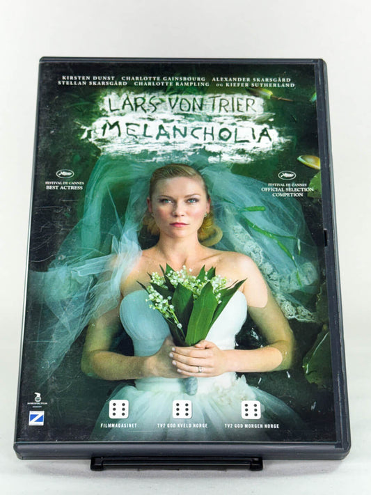 DVD-cover-forside til filmen Melancholia – Brukt DVD fra nettbutikken Brukbar Film