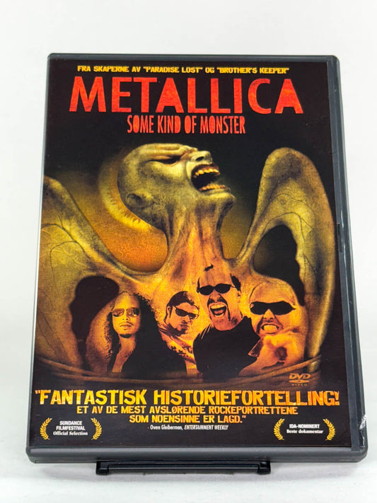Forside av DVD-cover til Metallica – Some Kind of Monster, dokumentarfilmen om bandets kriser og gjenfødelse under innspillingen av St. Anger – brukt musikkdokumentar på DVD hos Brukbar Film.