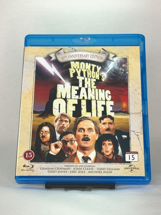 Forside av Blu-ray-cover til Monty Python’s The Meaning of Life – klassisk britisk komedie med John Cleese og Eric Idle, 30th Anniversary Edition, brukt Blu-ray hos Brukbar Film.