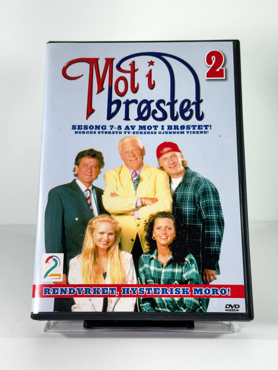 Forside av cover til Mot i brøstet 2 sesong 7-8, brukt DVD hos Brukbar Film
