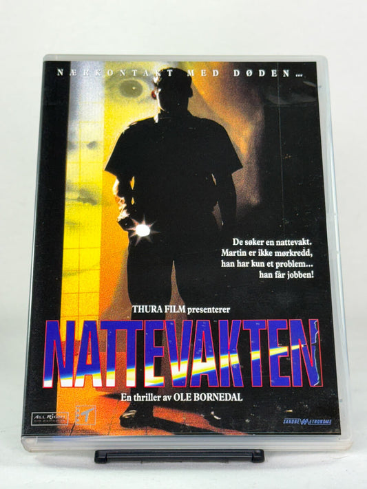 DVD-forside til filmen Nattevakten
Originalt cover brukt for produktbilde i nettbutikken Brukbar Film