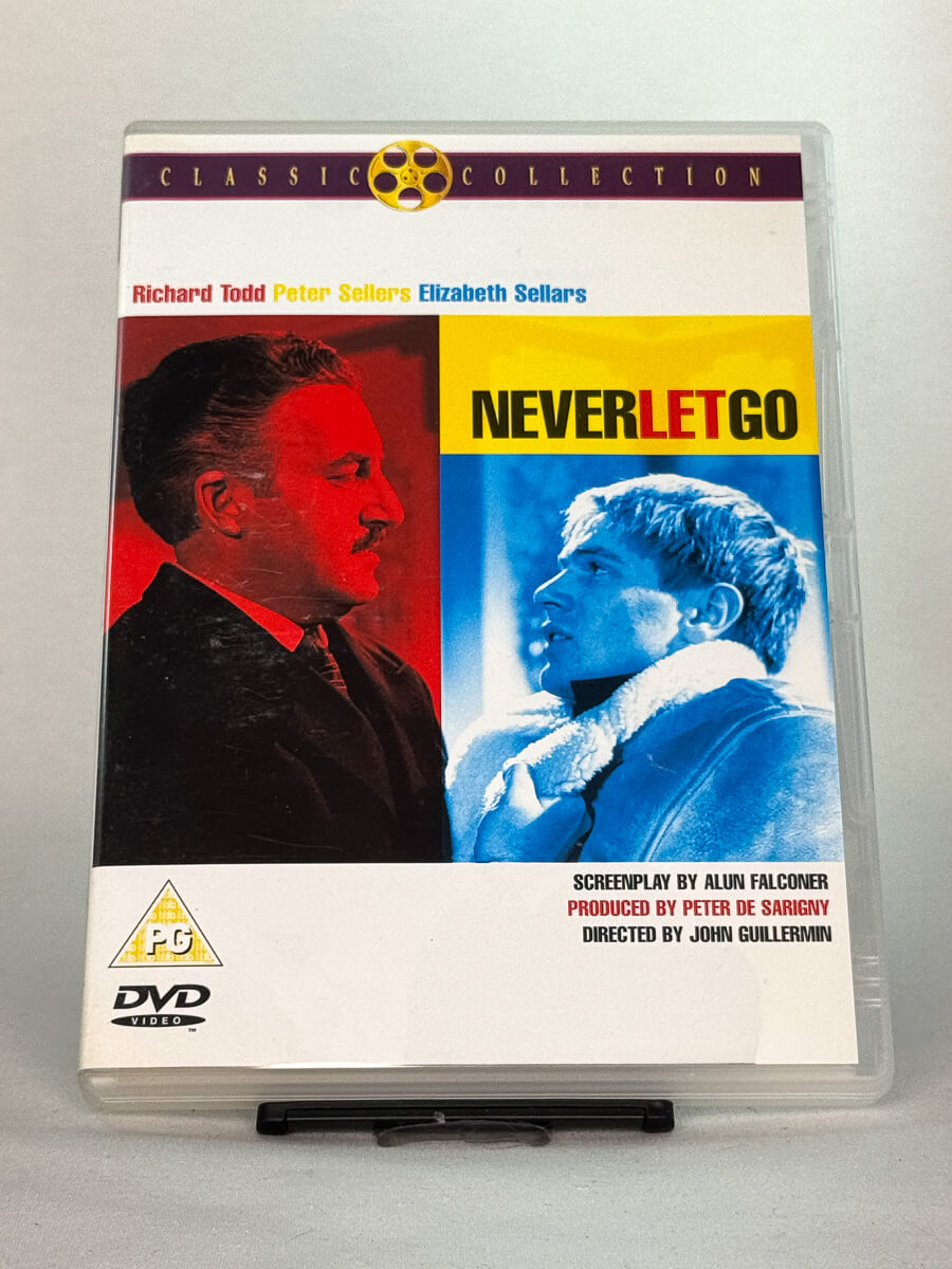 Forside av DVD-cover til Never Let Go – intens britisk thriller med Peter Sellers og Richard Todd, brukt film på DVD fra Brukbar Film.
