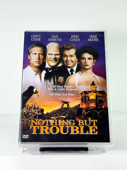 Forside av cover til Nothing But Trouble, brukt DVD hos Brukbar Film