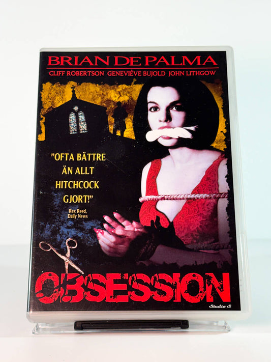 Forside av cover til Obsession, bruktfilm hos nettbutikken Brukbar Film