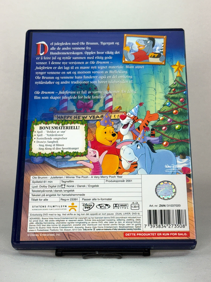 Bakside av DVD-cover til Ole Brumm – Juleferien – nyversjon med ekstra tegnet materiale og norsk tale – klassisk Disney-DVD tilgjengelig brukt hos Brukbar Film.