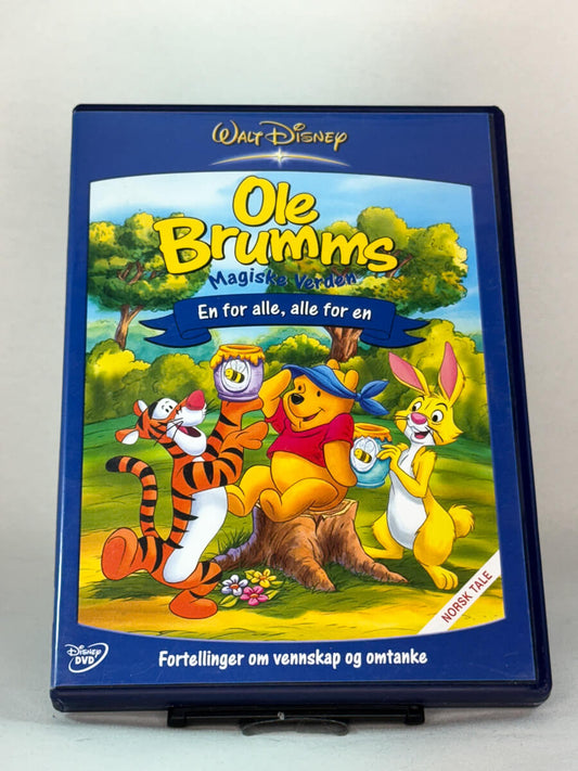 Forside av DVD-cover til Ole Brumm – Magiske verden: En for alle, alle for en – koselige historier om vennskap, brukt DVD hos Brukbar Film.