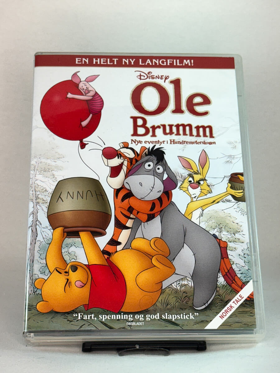 Forside av DVD-cover til Ole Brumm – Nye eventyr i Hundremeterskogen – Disneys varme og morsomme film med norsk tale, brukt DVD hos Brukbar Film.