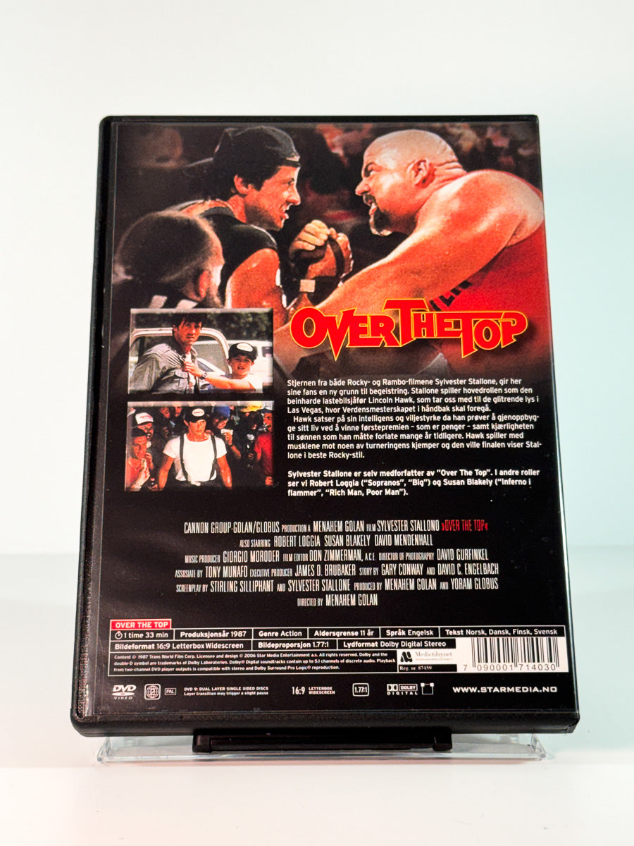 Bakside av cover til Over the Top, brukt DVD hos Brukbar Film