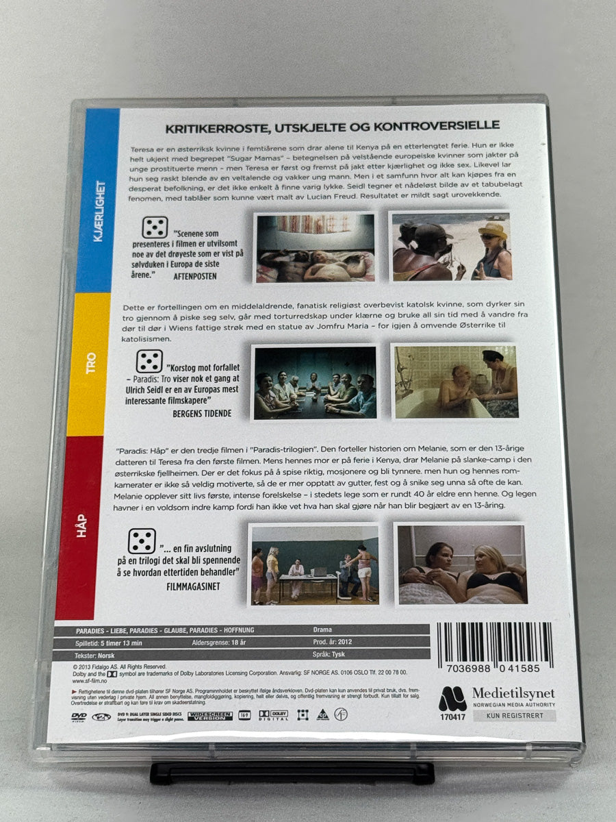 Bakside av DVD-cover til Paradis-trilogien – brukt originalfilm med tre filmer samlet, tilgjengelig hos Brukbar Film