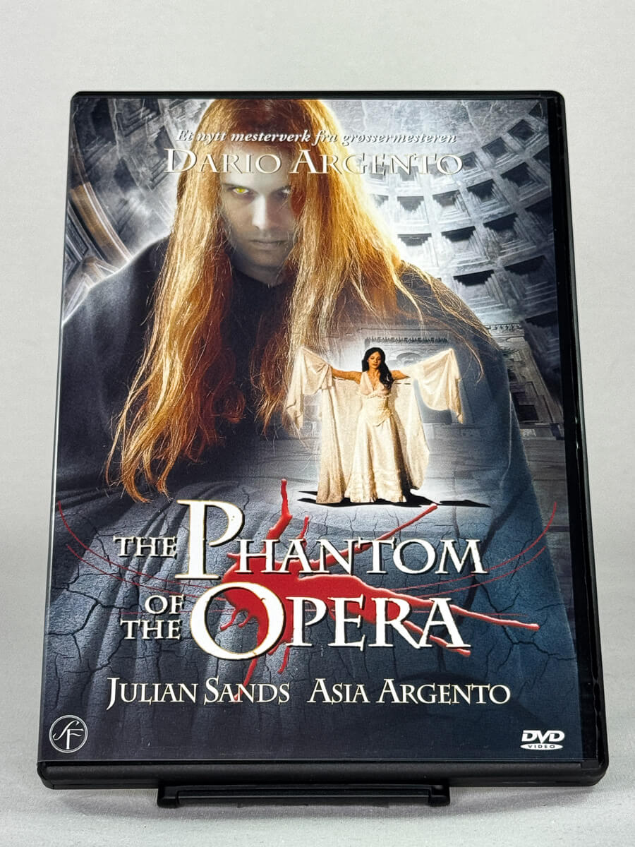 Forside av DVD-cover til The Phantom of the Opera – Dario Argentos skrekkversjon på brukt DVD, tilgjengelig hos Brukbar Film