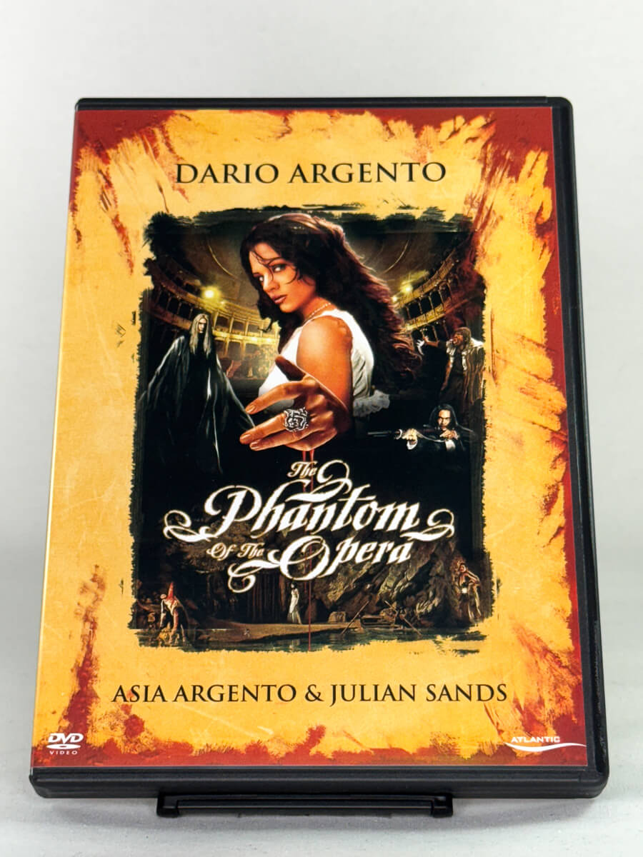 Forside av DVD-cover til The Phantom of the Opera – Dario Argentos skrekkversjon på brukt DVD, tilgjengelig hos Brukbar Film