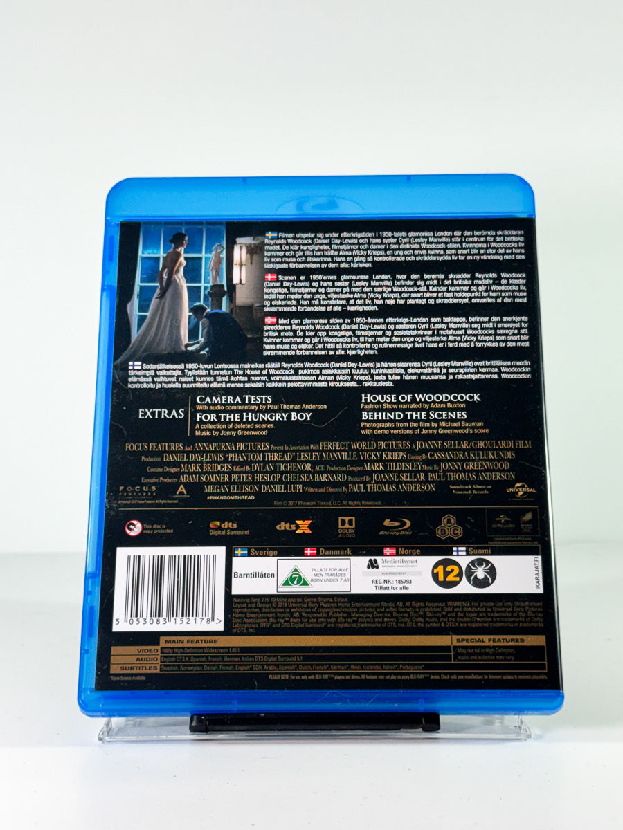 Bakside av cover til Phantom Thread på Blu-ray