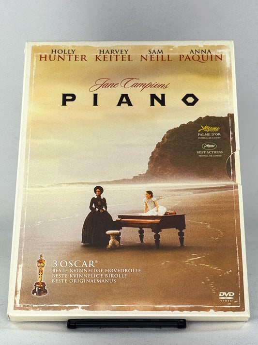 DVD-cover-forside til filmen Piano – Brukt DVD fra nettbutikken Brukbar Film