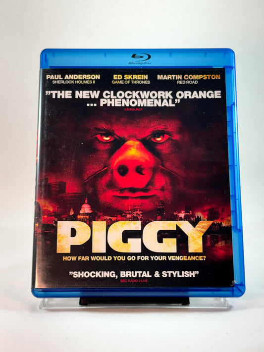 Forside av Blu-ray-cover til Piggy, bruktfilm på Blu-ray hos Brukbar Film