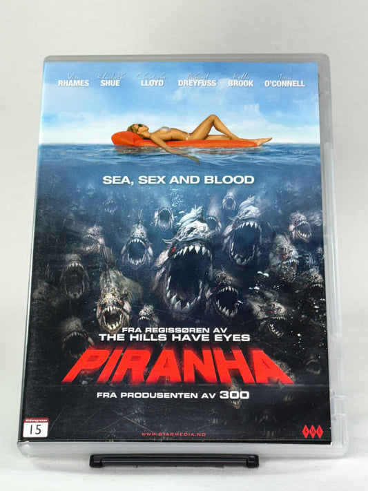 DVD-cover-forside til filmen Piranha – Brukt DVD fra nettbutikken Brukbar Film