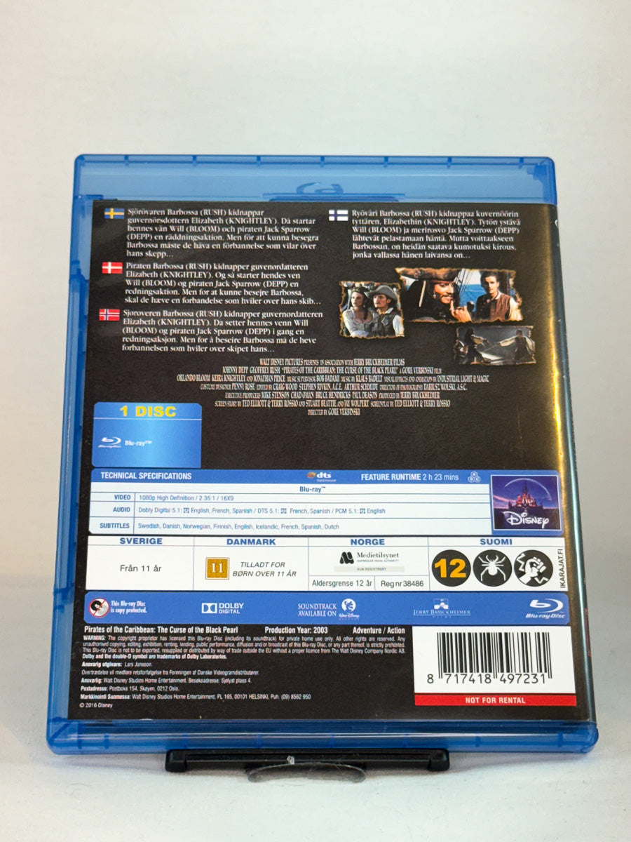 Bakside av Blu-ray-cover for Pirates of the Caribbean: The Curse of the Black Pearl – brukt Blu-ray hos Brukbar Film