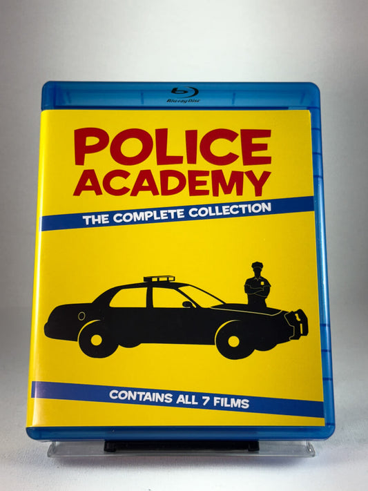 Forside av Blu-ray-cover til Police Academy – The Complete Collection, bruktfilm hos nettbutikken Brukbar Film