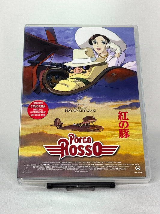 Forside av DVD-cover til Porco Rosso – klassisk Studio Ghibli-eventyr av Hayao Miyazaki med norsk tale og originalspråk – brukt animasjonsfilm på DVD tilgjengelig hos Brukbar Film.