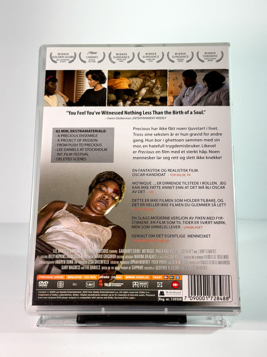 Bakside av cover til precious, brukt DVD hos Brukbar Film